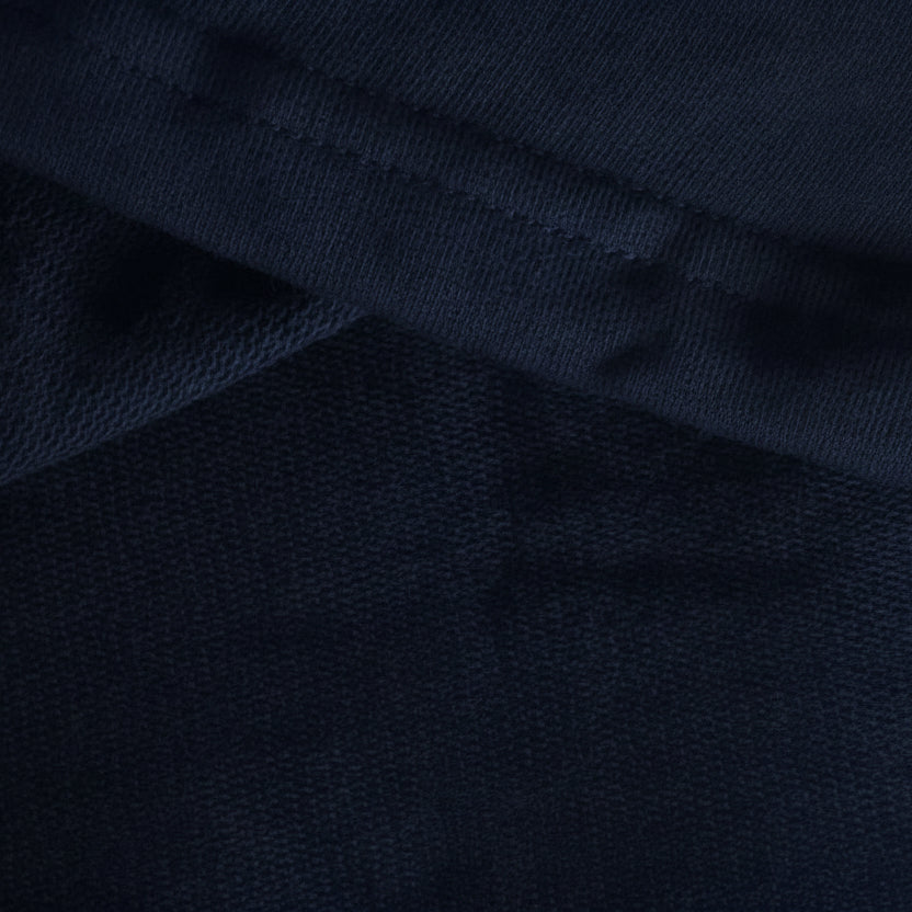 Close-up of blue fabric with a textured pattern